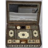 A 19th century Anglo-Indian ivory inlaid sandeli work sewing box, compartmentalised interior with