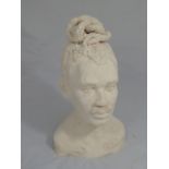 A terracotta bust of a man with dreadlocks, indistinctly signed to verso, H.39cm,