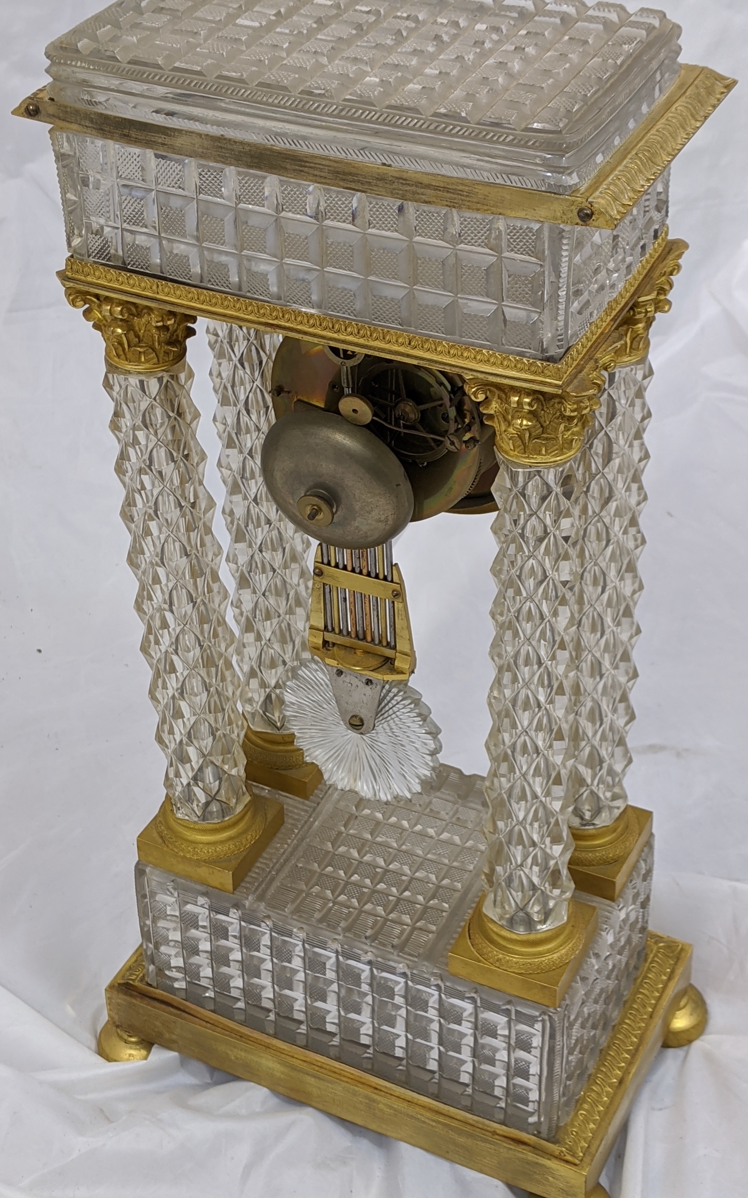 A French Empire Portico clock,four crystal column supports mounted with ormolu Corinthians with - Image 5 of 9