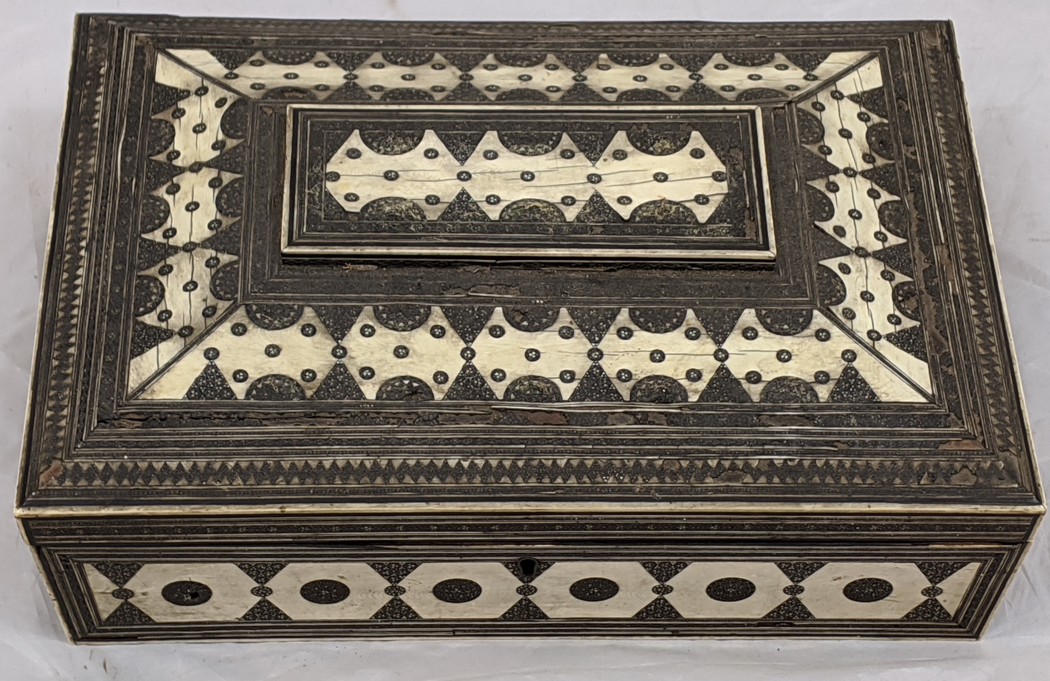 A 19th century Anglo-Indian ivory inlaid sandeli work sewing box, compartmentalised interior with - Image 3 of 3