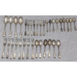 A collection of silver cutlery comprising on forks and spoons, various hallmarks and makers, some