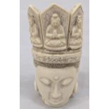 Late 19th/early 20th century Chinese ivory deity head, character marks to base. H.12cm This lot is