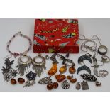 A collection of silver jewellery to include amber, bracelets, earrings, necklaces, rings etc.