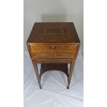 A 19th century mahogany marquetry inlaid writing stand raised on inlaid stand with tapered legs,