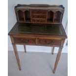 An early 20th century writing desk with green inlaid leather top, H.97cm W.63cm D.43cm