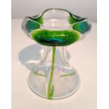 Stuart & Sons, an Art Nouveau Cairngorm glass vase with applied green peacock trail decoration,