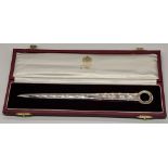 An Aspreys silver letter opener, hallmarked Sheffield, engraving to one side, cased L.20cm