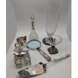 A collection of silver items to include a milk jug, perfume bottle, 2 vases, Aspreys ink well (glass
