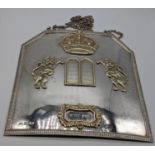 A silver Torah breastplate, interchangeable festival labels, applied lions of Judah, Torah crown and