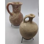 Two Bronze Age jars, antiquities interest, H.16cm and 15cm Provenance: Acquired by owner from J.