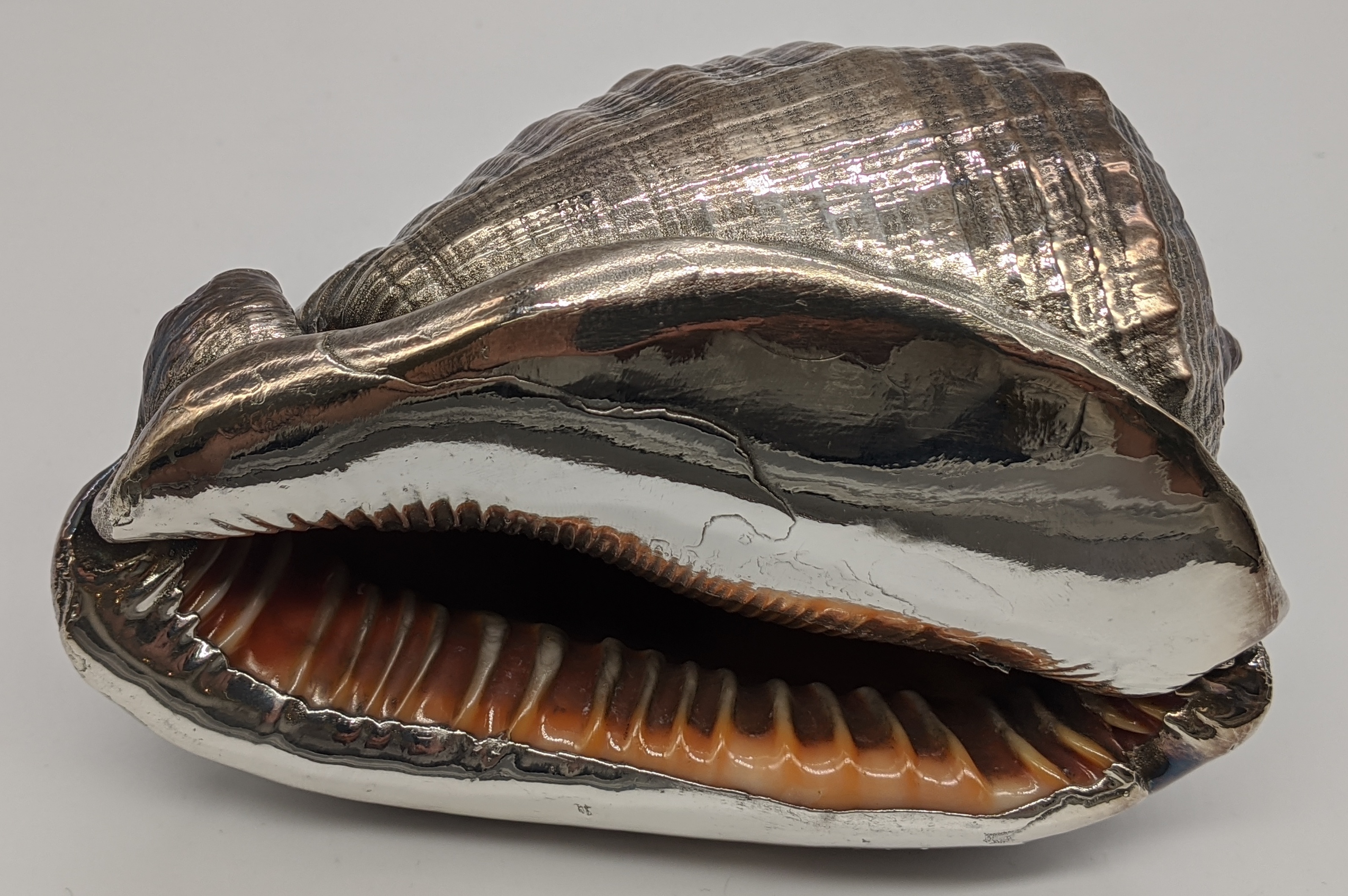 A silver coated conch shell by Mario Buccellati, H.5.5cm L.11cm W.7cm - Image 5 of 5