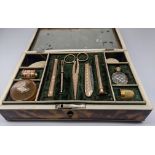 A late 19th century sewing set with gold items, indistinct marks, the box constructed of tortoise