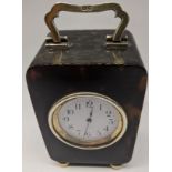 A early 20th century tortoise shell and silver carriage clock by Charles and Richard Comyns