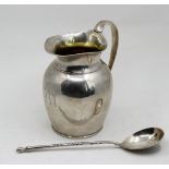 A 19th century Russian silver jug, stamped St.Petersburg City mark, 84, H.12cm,