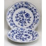 Pair of Meissen blue and white plates, D.24.5cm and 21.5cm