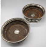 A pair of Georgian silver wine coasters, hallmarked, 1800-1810, John Roberts & Co. D.14.5cm