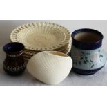 A Belleek vase, two Doulton Lambeth vases and a set of Prussian plates