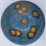 Tessa Fuchs (1936-2012), Sunflowers on a blue ground, studio pottery bowl, monogrammed to base, D.