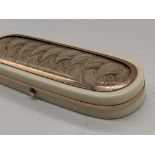 A 19th century ivory patch box/ toothpick case, mounted with gold and plaited hair, internal