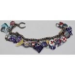 A silver chain charm bracelet with multiple city charms, various marks, total weight 59.7g