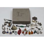 A large collection of silver jewellery to include pearls, amber, malachite, Deco pieces, Middle