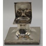 A Walker & Hall silver inkwell with Greek key design border, the opening mechanism on X-stretcher,