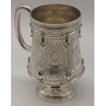 A Scottish silver mug, hallmarked Edinburgh, 1876, engraved, 194g, H.11.5cm