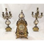 A 19th century Sevres gilt brass clock with garniture, integrated porcelain hand painted bucolic