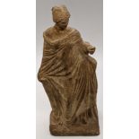 A Greek Tanagra terracotta statuette representing Venus and the golden apple, 19th century