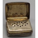 A George IV silver vinaigrette by John Bettridge, hallmarked Birmingham 1825, 2cm x 1cm