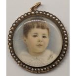 Violet Linton (fl.1899-1940), miniature portrait of a boy, signed V.Linton and dated 1901, on a gold