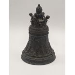A Continental cast bronze bell, decorated with cherubs and figural scenes, H.13cm