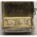A George III silver purse vinaigrette, hallmarked Birmingham, 1815, 13g, 3cm x 2cm