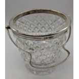 An Early 20th century silver and glass ice bucket by Joseph Rodgers & Sons with separate ice