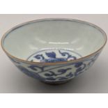 A Chinese Wanli period blue and white porcelain bowl with flora and figural scrolling decoration,