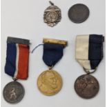 A collection of Jewish and Masonic medals. A bronze Lewis Emanuel Jewish Lads` Brigade medal,