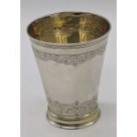 A 17th century German silver beaker, gilt interior, marks for Augsburg, 73g, H.7.5cm