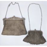 Two early 20th century sterling silver handbags, both stamped sterling, both with carrying chains,