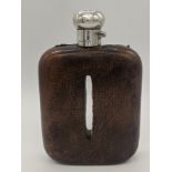 A large silver and glass hip flask with leather cover, the collar hallmarked Birmingham, 1928, maker