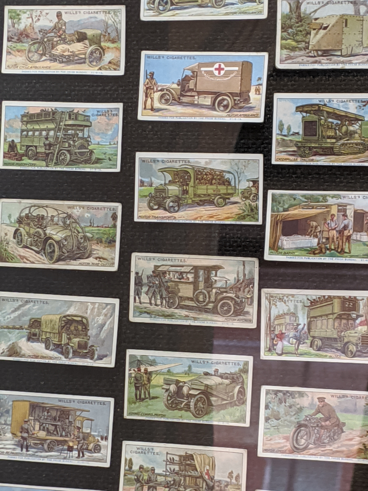 A collection of military interest items to include a framed collection of Wills Cigarette cards of - Image 8 of 14