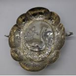 A German/Austrian silver twin handled dish depicting a Swan, repousse embossed, 173g, H.3.5cm L.18cm