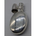 A silver hip flask with shot cup as lid, hallmarked Birmingham, 1896, maker George Edwin Walton,