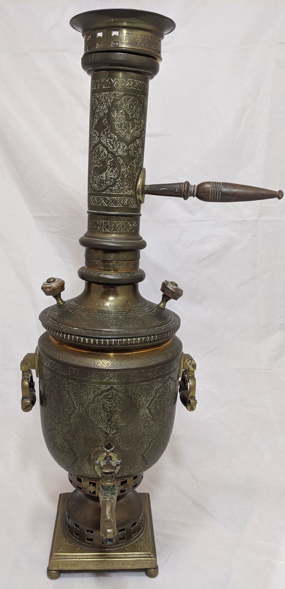 A Russian samovar made for the Qajar Persian market, early 20th century , engraved with stylised