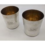 A pair of 19th century Portuguese silver beakers, gilt interior, hallmarked Lisbon, maker mark J.P.