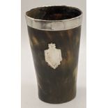 A 19th century horn beaker with silver mount, indistinct British hallmarks, vacant cartouche,