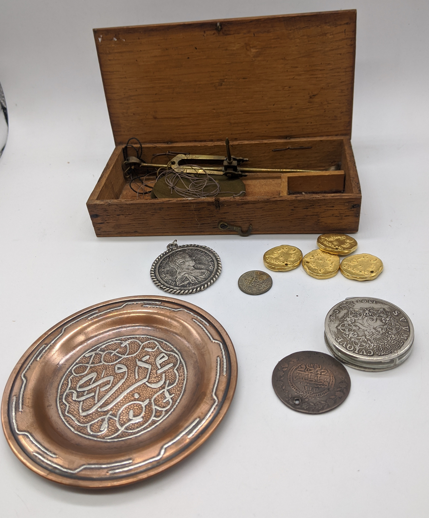 Mixed lot of coins, weighing scales, a Middle Eastern copper silver inlaid dish etc.