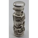 A silver vinaigrette/scent bottle with huntings scenes to side, integrated gilt compartment with