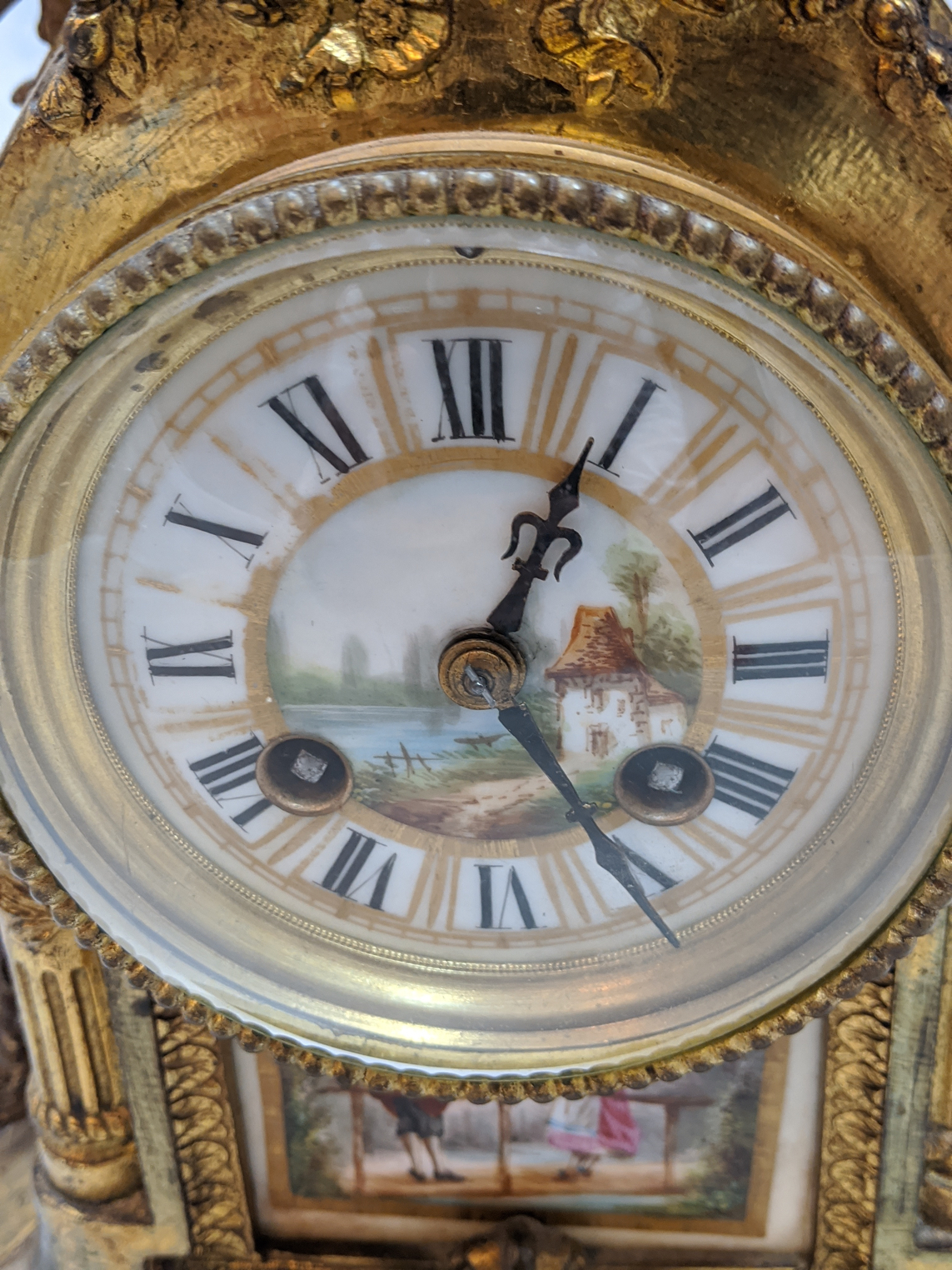 A 19th century Sevres gilt brass clock with garniture, integrated porcelain hand painted bucolic - Image 3 of 5