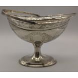 An Irish 18th century silver swing handled basket, vacant cartouche, hallmarked Dublin, 1796,