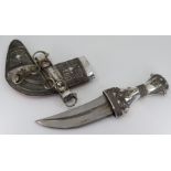 A late 19th Century silver Arab Khanjar / Jambiya dagger. Intricate filigree decoration throughout